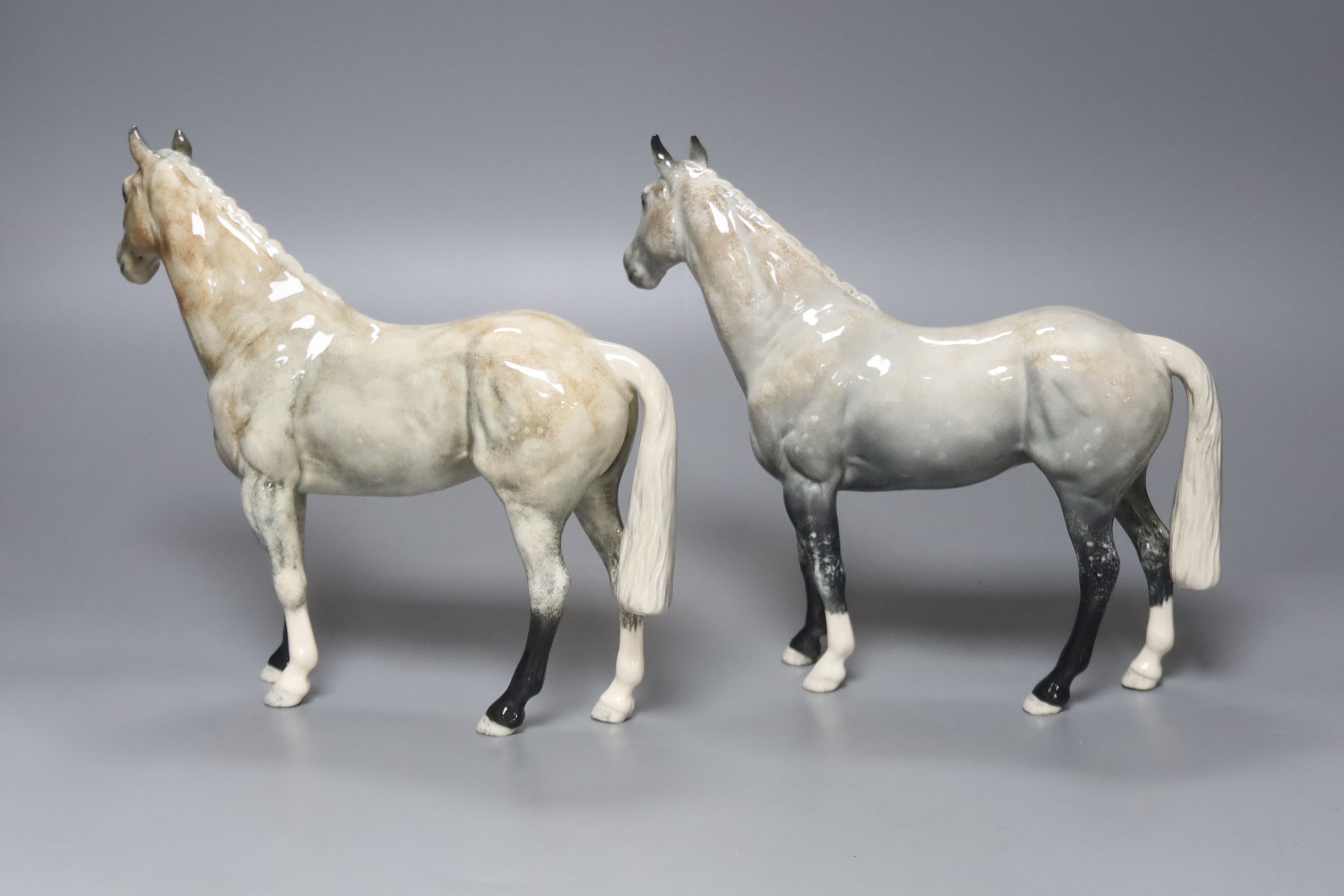 Two Royal Doulton grey horses, height 20cm